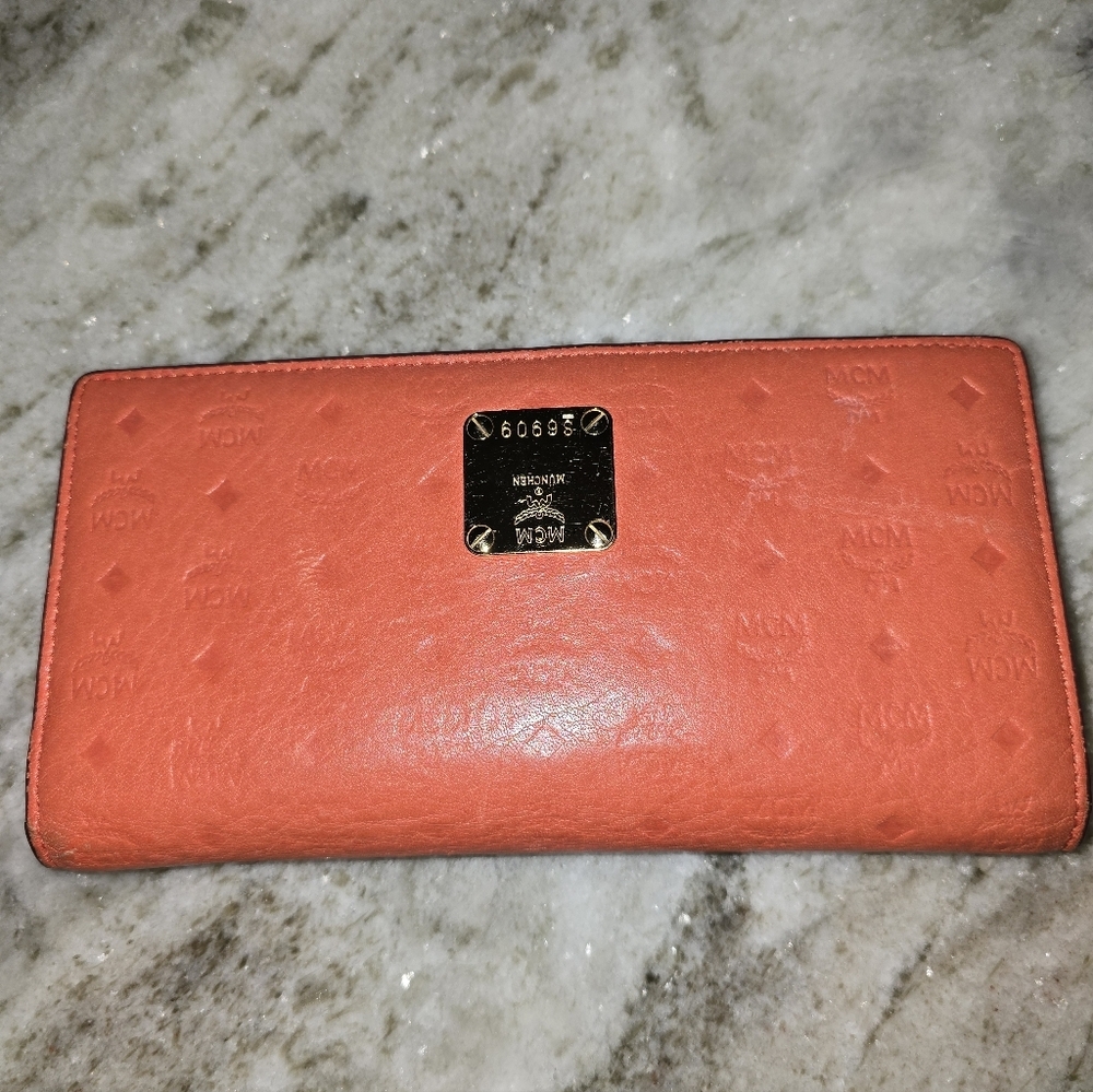 MCM Orange Embossed Leather.Authentic